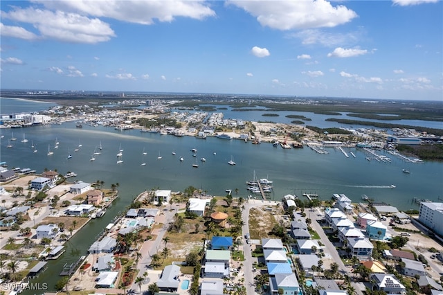 aerial view featuring a water view and a residential view