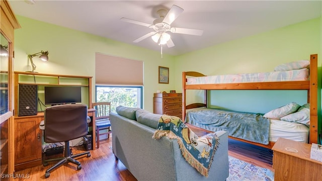 1017 SW 37th Ln, Cape Coral, FL 33914 - bedroom with wood finished floors and a ceiling fan