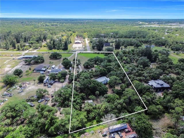 18511 Slater Rd, North Fort Myers, FL 33917 - aerial view of property's location with a forest and property parcel outlined