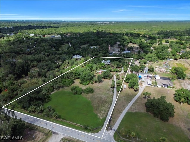 18511 Slater Rd, North Fort Myers, FL 33917 - aerial view of property's location with a heavily wooded area and property parcel outlined