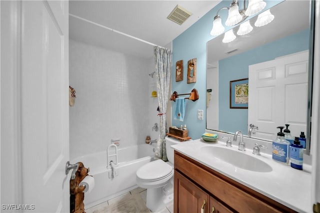18511 Slater Rd, North Fort Myers, FL 33917 - full bath with toilet, shower / bath combo with shower curtain, vanity, and tile patterned floors