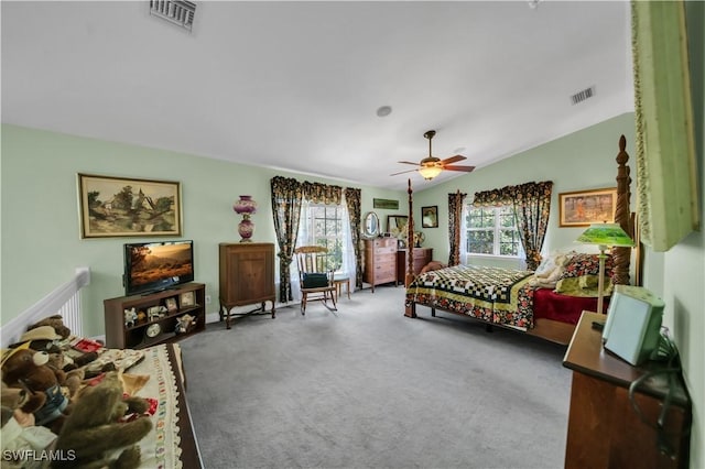 18511 Slater Rd, North Fort Myers, FL 33917 - bedroom with multiple windows, carpet flooring, ceiling fan, and lofted ceiling