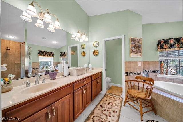 18511 Slater Rd, North Fort Myers, FL 33917 - bathroom featuring tile patterned floors, toilet, a shower stall, a bath, and a chandelier