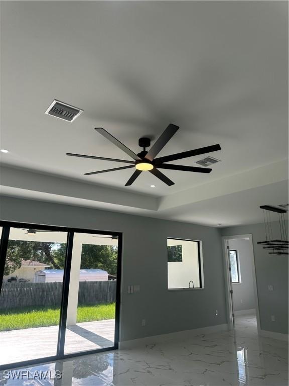 178 Mcarthur Blvd, Lehigh Acres, FL 33974 - spare room featuring marble finish flooring, recessed lighting, and ceiling fan