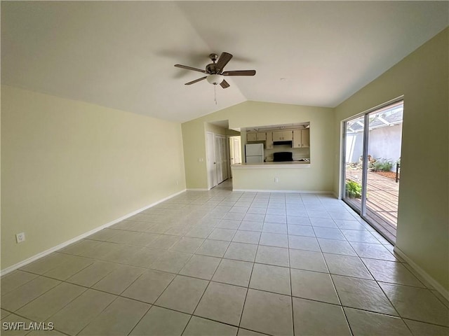unfurnished living room featuring baseboards, ceiling fan, light tile patterned flooring, and lofted ceiling