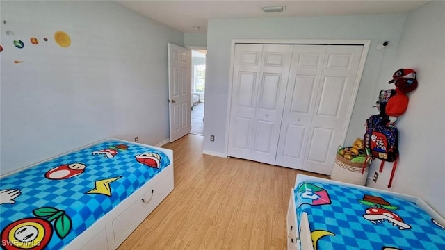 2847 SW 26th Pl, Cape Coral, FL 33914 - bedroom with a closet, light wood-style flooring, and visible vents