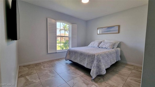 2847 SW 26th Pl, Cape Coral, FL 33914 - bedroom featuring baseboards