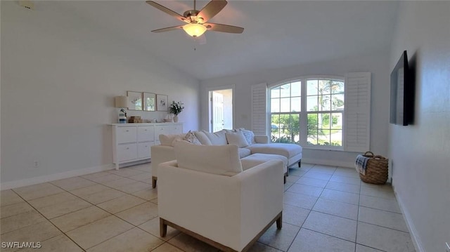2847 SW 26th Pl, Cape Coral, FL 33914 - living room with baseboards, ceiling fan, light tile patterned floors, and high vaulted ceiling