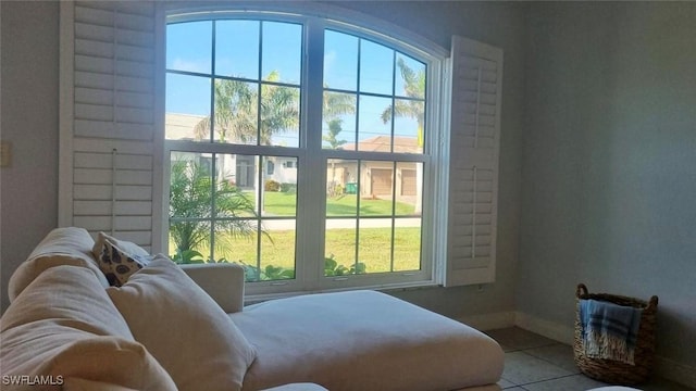 2847 SW 26th Pl, Cape Coral, FL 33914 - interior space with baseboards, plenty of natural light, and tile patterned flooring