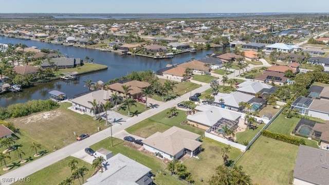 2847 SW 26th Pl, Cape Coral, FL 33914 - drone / aerial view with a water view and a residential view