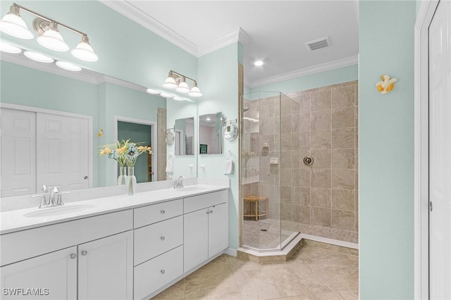 full bathroom with visible vents, a walk in shower, ornamental molding, and a sink