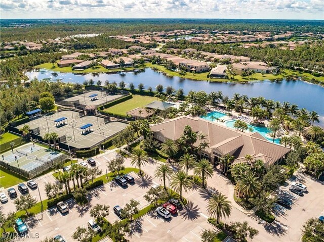 3454 Pacific Dr, Naples, FL 34119 - aerial view of residential area featuring a pool area and a nearby body of water