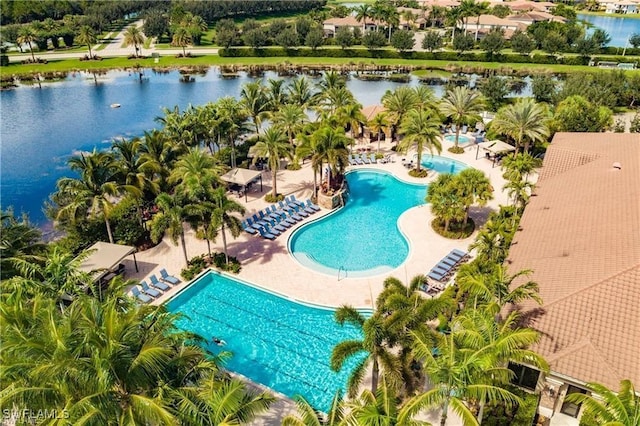 birds eye view of property featuring a water view