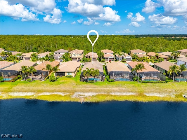 3454 Pacific Dr, Naples, FL 34119 - aerial view of residential area featuring a forest and a large body of water