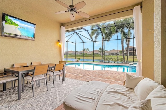 3454 Pacific Dr, Naples, FL 34119 - view of swimming pool featuring a patio, a ceiling fan, a pool with connected hot tub, glass enclosure, and outdoor dining area