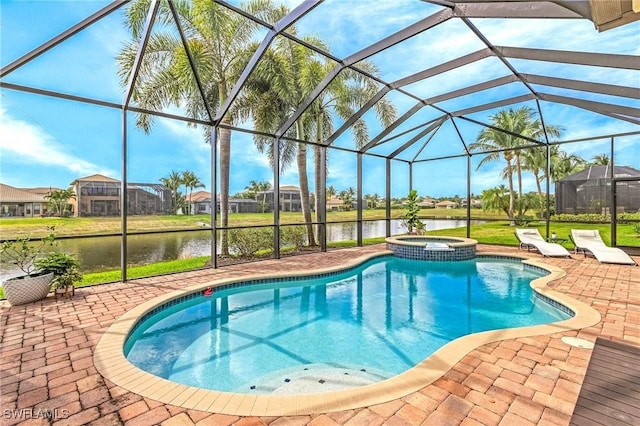 3454 Pacific Dr, Naples, FL 34119 - view of pool featuring a patio area, a water view, glass enclosure, and a pool with connected hot tub