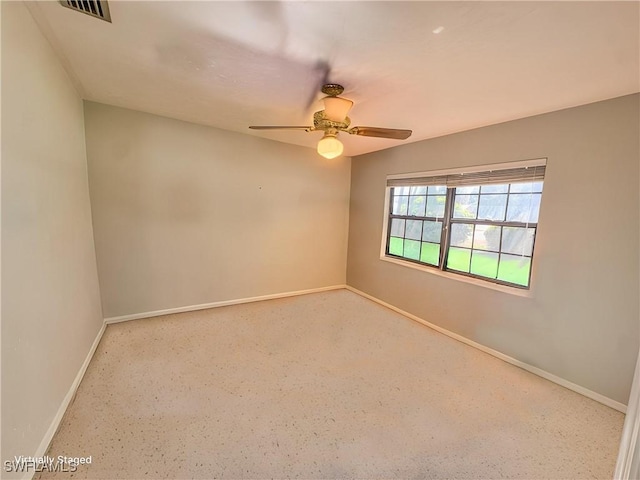 75 Hardee St, Labelle, FL 33935 - spare room with a ceiling fan and baseboards