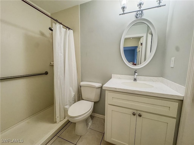 75 Hardee St, Labelle, FL 33935 - full bath with tile patterned floors, a stall shower, toilet, and vanity