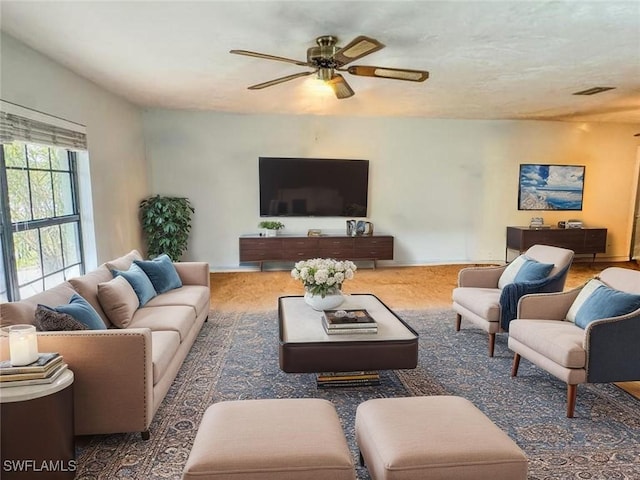 75 Hardee St, Labelle, FL 33935 - carpeted living room featuring a ceiling fan