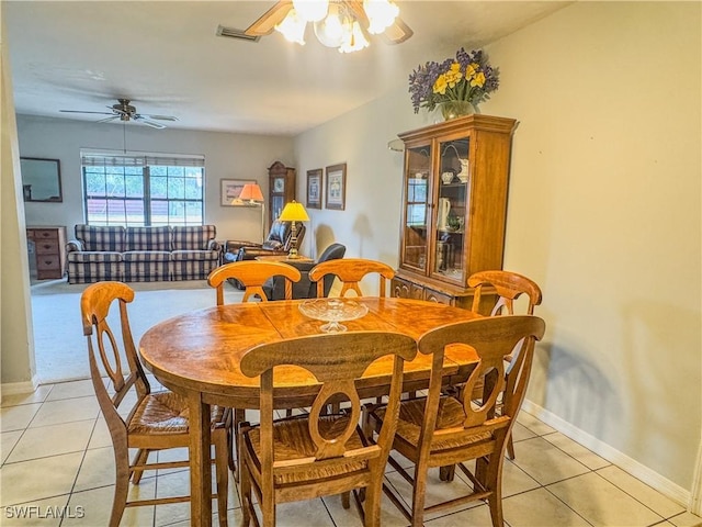 75 Hardee St, Labelle, FL 33935 - dining space with light tile patterned floors, a ceiling fan, and baseboards