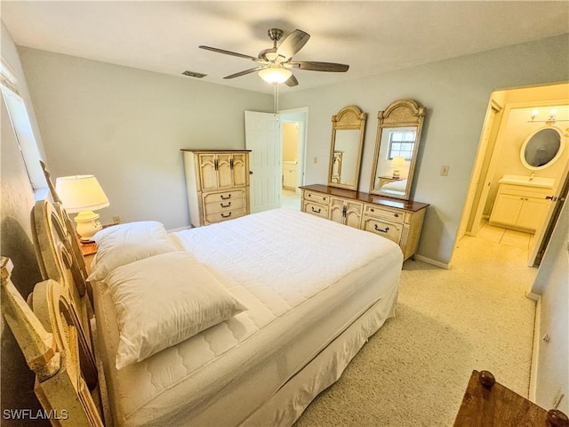 75 Hardee St, Labelle, FL 33935 - bedroom with light carpet, a ceiling fan, and baseboards