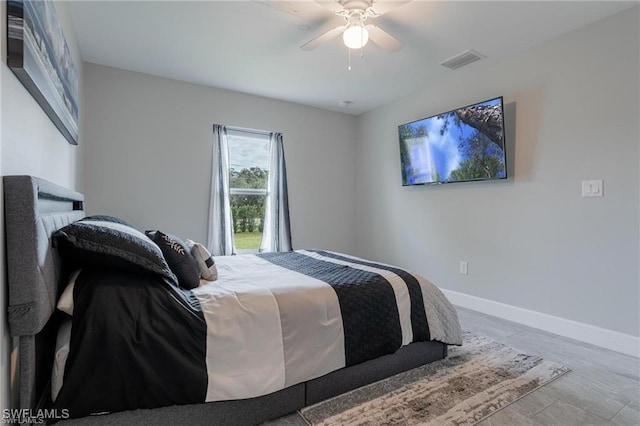 168 Village Cir Unit 9, Labelle, FL 33935 - bedroom featuring baseboards and a ceiling fan