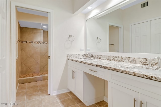 512 Sugar Pine Ln Unit 512, Naples, FL 34108 - full bath featuring double vanity, visible vents, tiled shower, and a sink