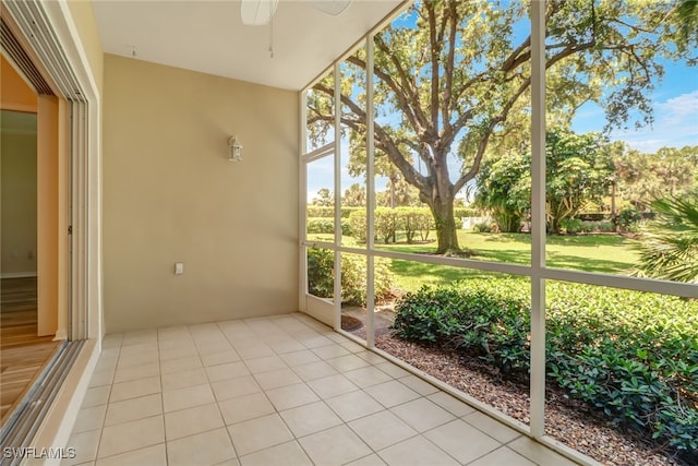 512 Sugar Pine Ln Unit 512, Naples, FL 34108 - unfurnished sunroom with a ceiling fan