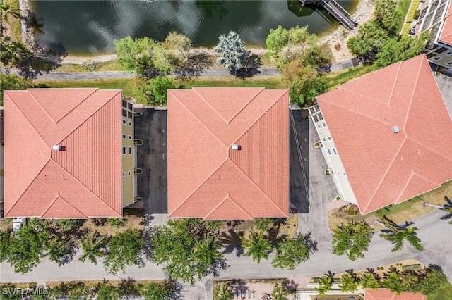 drone / aerial view with a water view