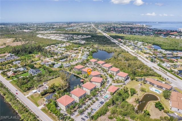 aerial view featuring a water view and a residential view