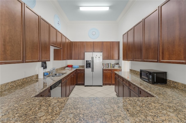 kitchen with a sink, crown molding, stone countertops, and appliances with stainless steel finishes