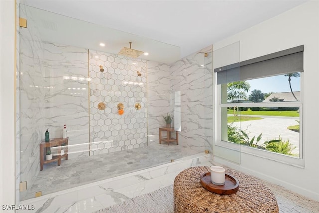 full bathroom with marble finish floor, recessed lighting, and a walk in shower