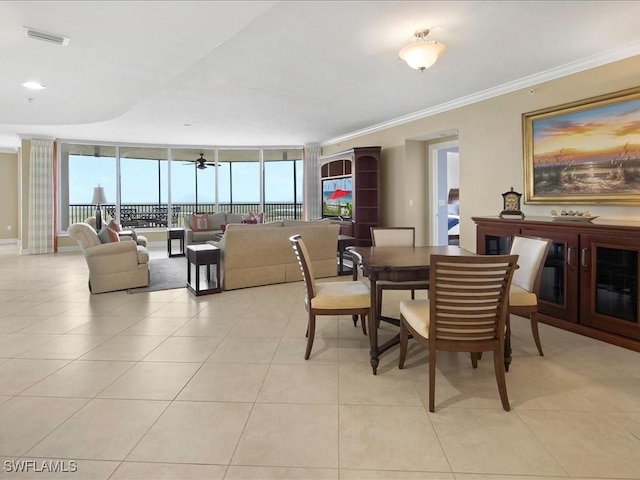 1050 Borghese Ln Unit 1804, Naples, FL 34114 - dining area featuring crown molding, light tile patterned floors, visible vents, and a ceiling fan