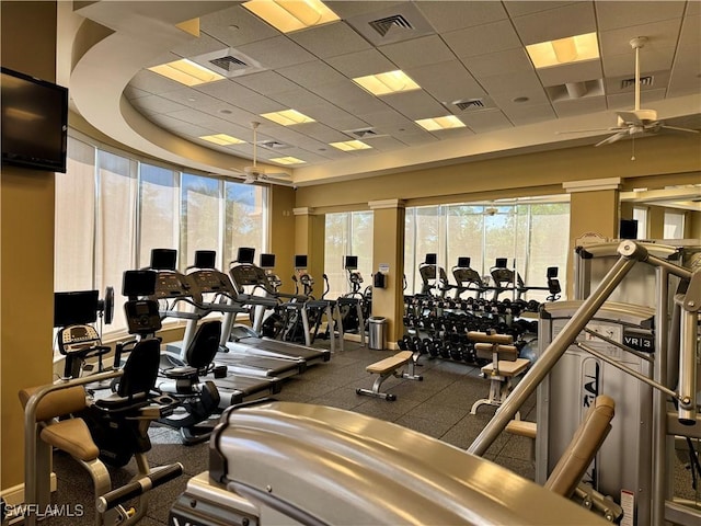 1050 Borghese Ln Unit 1804, Naples, FL 34114 - exercise room featuring ceiling fan, plenty of natural light, visible vents, and a drop ceiling