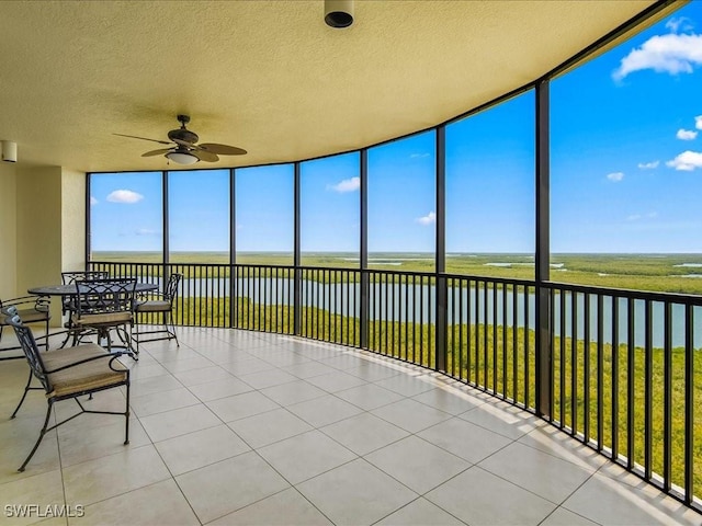 1050 Borghese Ln Unit 1804, Naples, FL 34114 - sunroom featuring a water view
