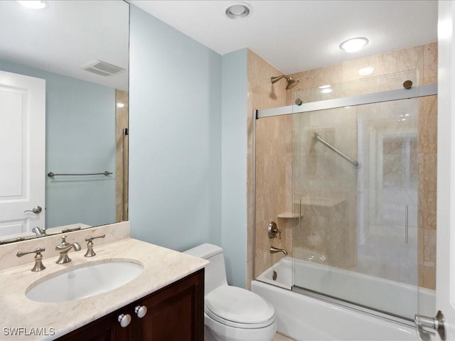 1050 Borghese Ln Unit 1804, Naples, FL 34114 - full bathroom featuring vanity, toilet, bath / shower combo with glass door, and visible vents