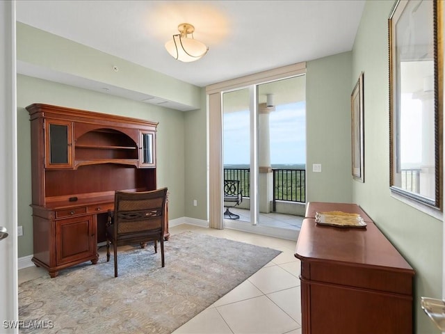 1050 Borghese Ln Unit 1804, Naples, FL 34114 - office featuring light tile patterned floors and a wall of windows