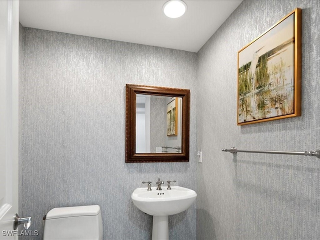 1050 Borghese Ln Unit 1804, Naples, FL 34114 - bathroom with a sink and toilet