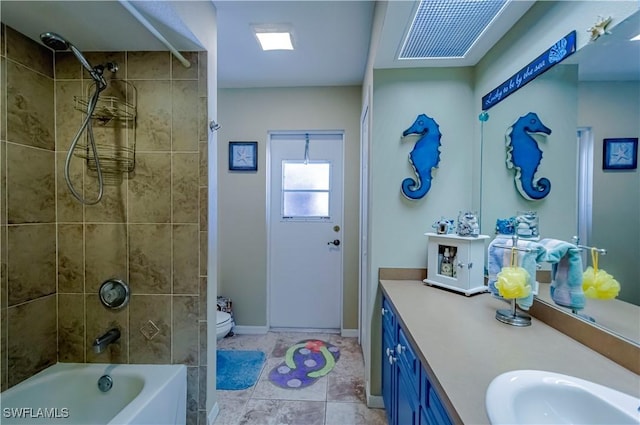 2128 SW 28th Ln, Cape Coral, FL 33914 - bathroom featuring toilet, vanity, tile patterned floors, shower / bath combination, and baseboards