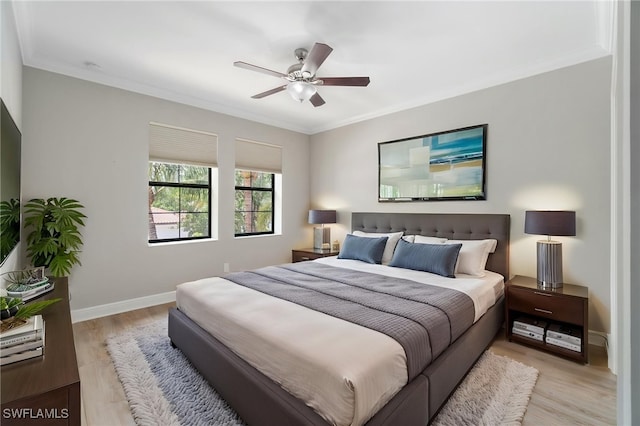 4437 Tamarind Way, Naples, FL 34119 - bedroom featuring light wood-style flooring, ornamental molding, baseboards, and ceiling fan