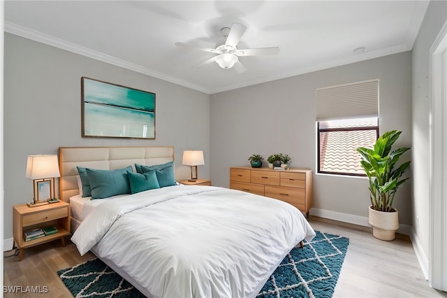 4437 Tamarind Way, Naples, FL 34119 - bedroom with light wood-style flooring, crown molding, baseboards, and a ceiling fan