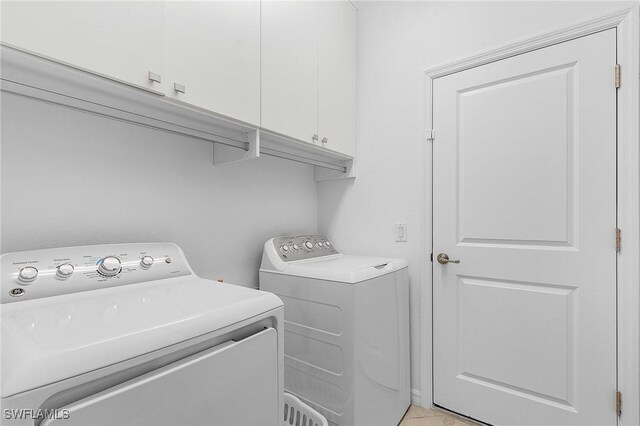 14634 Cantabria Dr, Fort Myers, FL 33905 - washroom featuring cabinet space and washer and clothes dryer