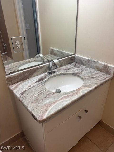 8326 Bernwood Cove Loop Unit 901, Fort Myers, FL 33966 - bathroom featuring vanity and tile patterned floors