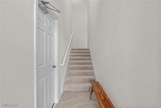 11792 Grand Belvedere Way Unit 202, Fort Myers, FL 33913 - staircase with tile patterned floors