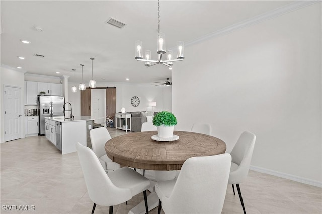 11792 Grand Belvedere Way Unit 202, Fort Myers, FL 33913 - dining area with ornamental molding, a barn door, visible vents, and recessed lighting