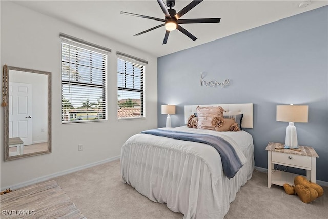 11792 Grand Belvedere Way Unit 202, Fort Myers, FL 33913 - bedroom featuring light colored carpet, baseboards, and ceiling fan