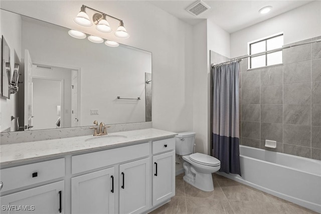 11792 Grand Belvedere Way Unit 202, Fort Myers, FL 33913 - bathroom featuring toilet, vanity, visible vents, tile patterned floors, and shower / bathtub combination with curtain