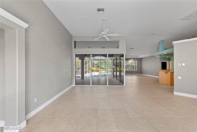15461 River Cove Ct, North Fort Myers, FL 33917 - empty room with baseboards, a ceiling fan, light tile patterned floors, and visible vents