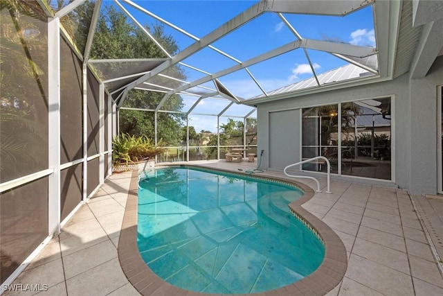 15461 River Cove Ct, North Fort Myers, FL 33917 - pool featuring glass enclosure and a patio