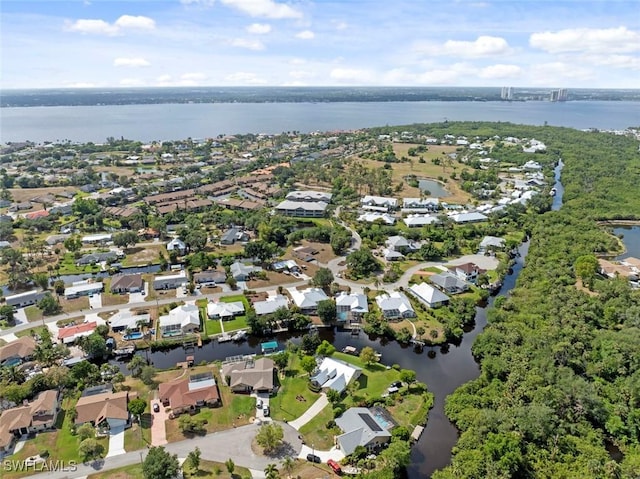 15461 River Cove Ct, North Fort Myers, FL 33917 - drone / aerial view featuring a water view and a residential view